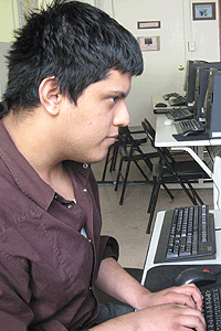 Guy Reading Computer Screen